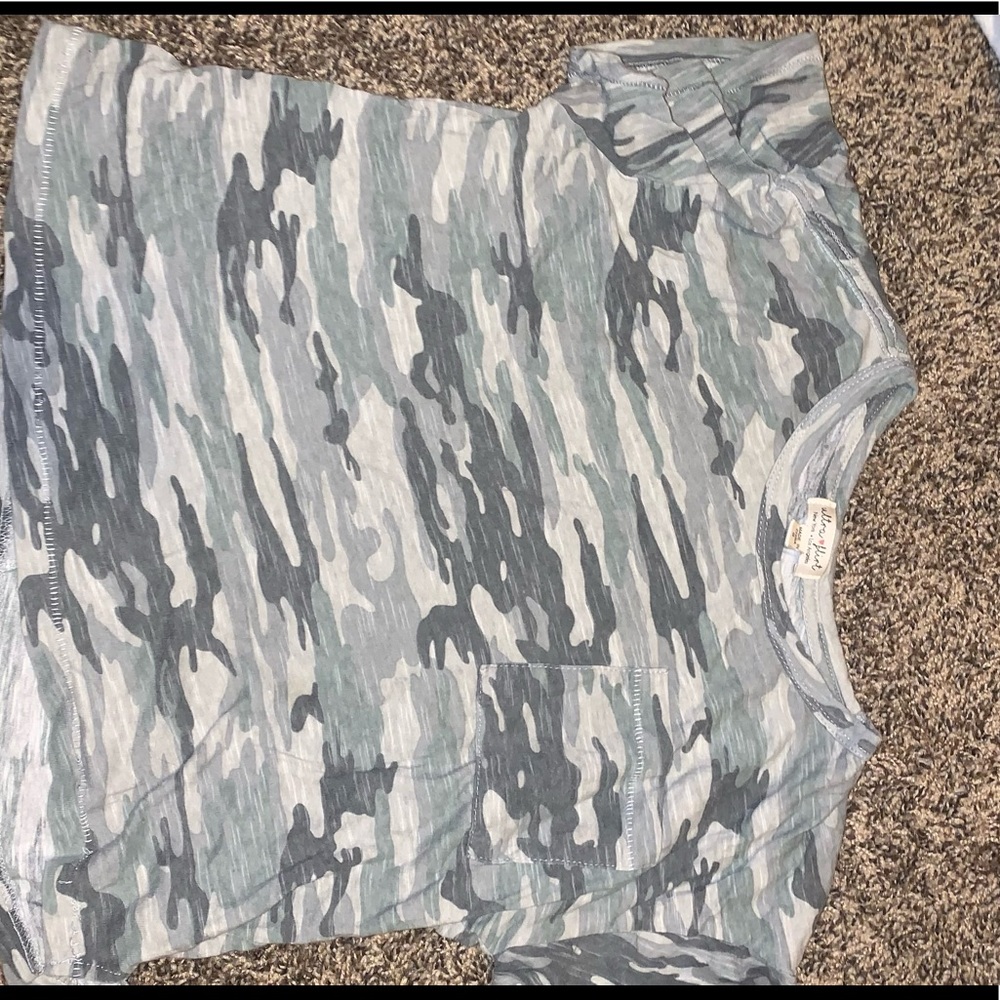 I’m selling this camouflage top from Ultra Flirt